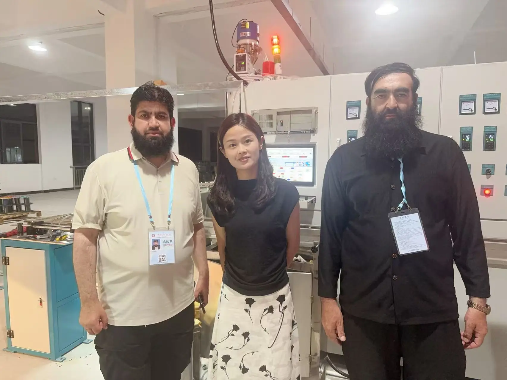 Can you guess which country these customers are from? They're visiting our factory